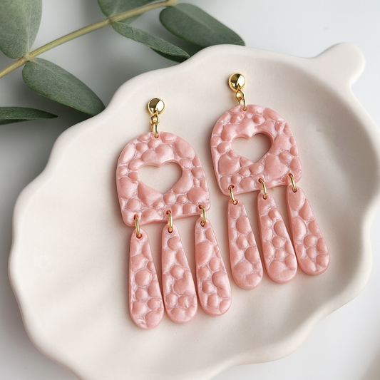 textured heart dangle earrings handmade using polymer clay